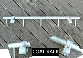 Metal coat rack accessory for canvas wall tent frame with multiple hanging hooks and clamp-on mounting brackets for organizing camping gear and clothing.