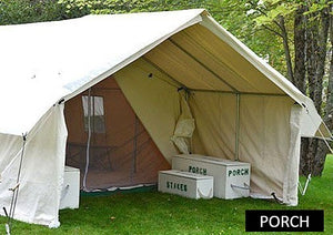 Large wilderness tent with attached porch storing camping gear and supplies protected from the elements in a forest campsite